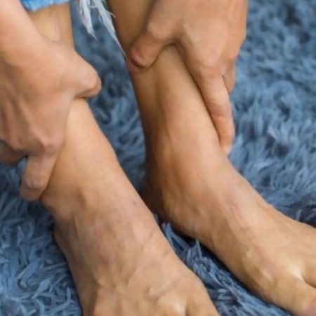 Numbness and tingling in the legs or feet